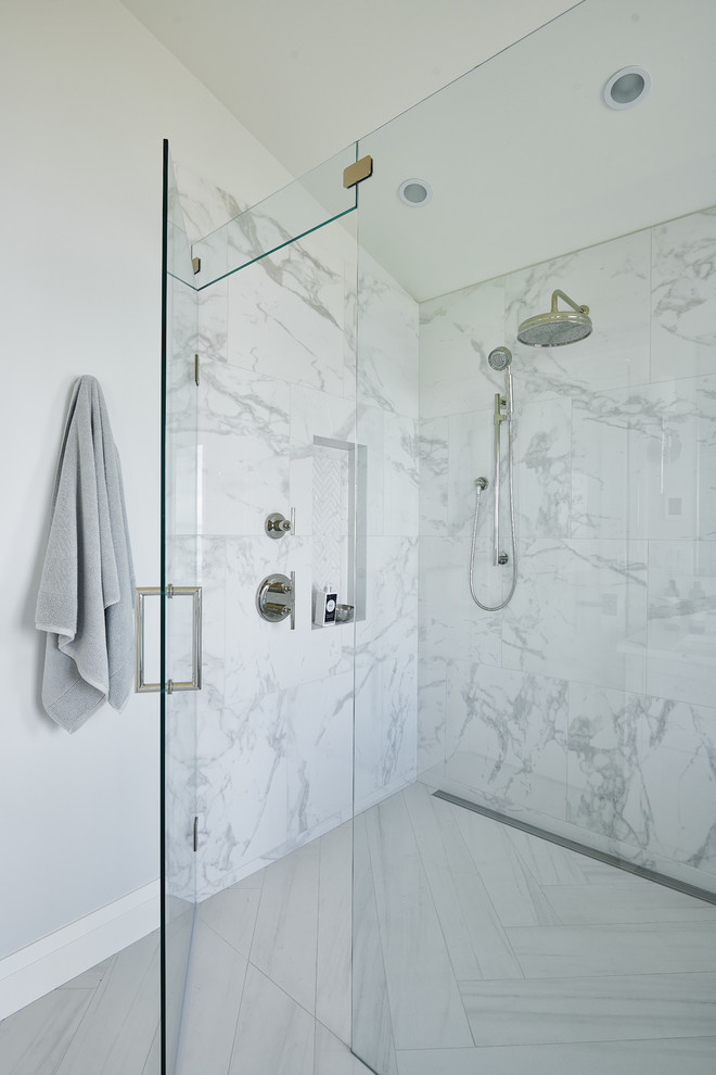 Example of a large trendy master gray tile and marble tile gray floor and porcelain tile bathroom design in Vancouver with furniture-like cabinets, white cabinets, a one-piece toilet, gray walls, an undermount sink, quartz countertops, white countertops and a hinged shower door
