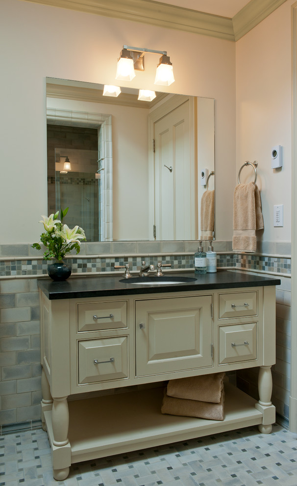 Inspiration for a mid-sized timeless master blue tile and ceramic tile mosaic tile floor doorless shower remodel in Other with an undermount sink, white walls, yellow cabinets, a two-piece toilet, furniture-like cabinets, granite countertops and a hinged shower door