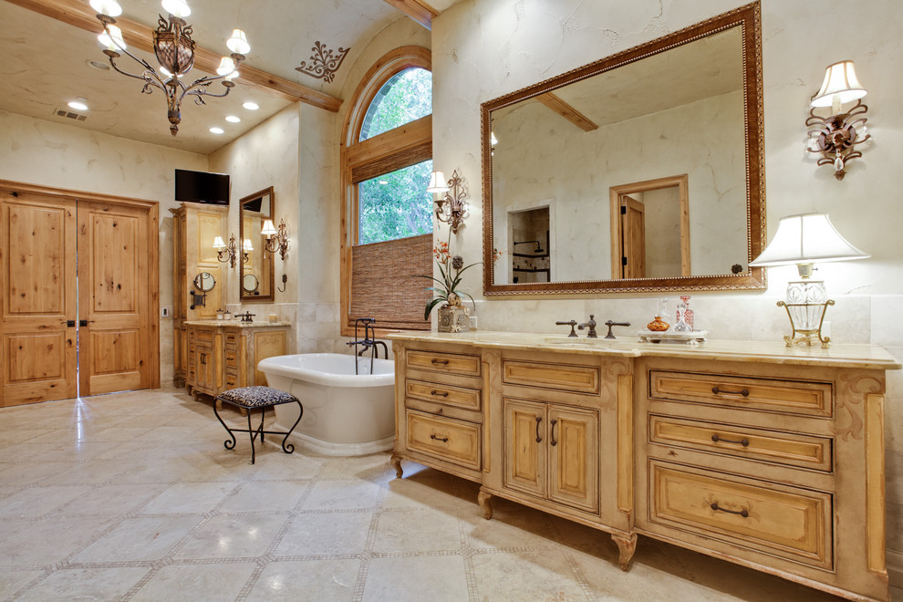 Photo of a classic bathroom in Dallas with a freestanding bath.