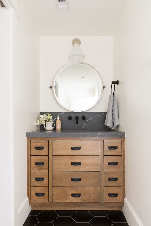 Bathroom - mid-sized transitional 3/4 black floor bathroom idea in Salt Lake City with medium tone wood cabinets, white walls and multicolored countertops