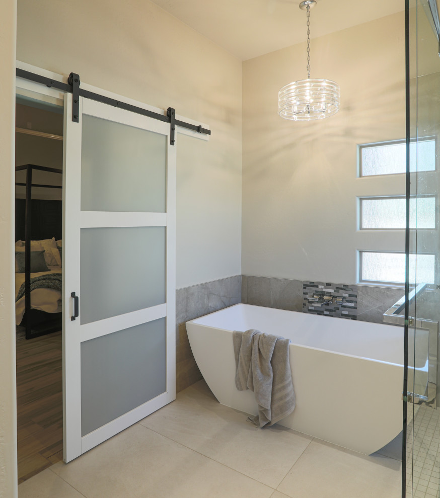 Inspiration for a small contemporary ensuite bathroom in Phoenix with shaker cabinets, distressed cabinets, a freestanding bath, a built-in shower, a one-piece toilet, multi-coloured tiles, porcelain tiles, beige walls, porcelain flooring, an integrated sink, granite worktops, beige floors, a hinged door and white worktops.