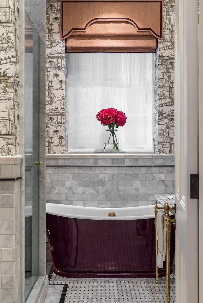 Large traditional family bathroom in London with a freestanding bath, an alcove shower, a one-piece toilet, grey tiles, marble tiles, grey walls, marble flooring, a wall-mounted sink, marble worktops, grey floors, a hinged door and grey worktops.