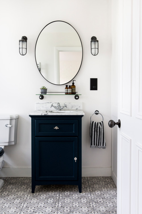 Navy Elegance: Navy-blue Vanity with Marble Countertop and Glass Shelf Bathroom Mirror Ideas