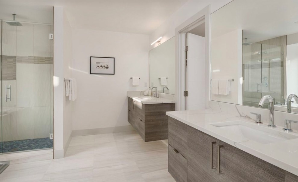 Double shower - large contemporary master white tile and ceramic tile ceramic tile and gray floor double shower idea in Seattle with flat-panel cabinets, gray cabinets, an undermount tub, a one-piece toilet, white walls, an undermount sink, quartz countertops and a hinged shower door