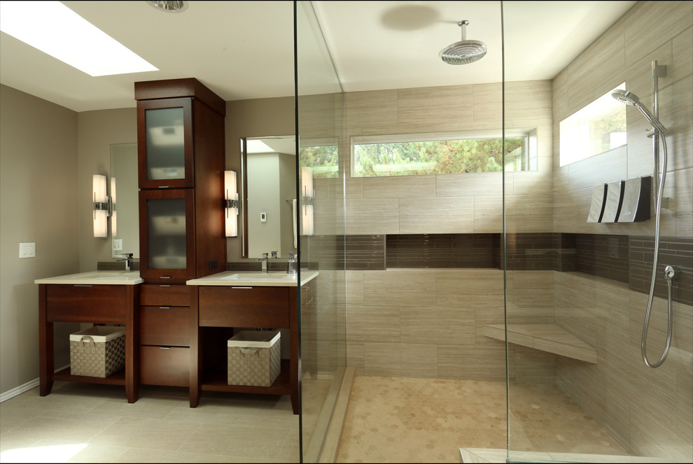 Inspiration for a medium sized contemporary ensuite bathroom in Portland with flat-panel cabinets, dark wood cabinets, a built-in shower, a two-piece toilet, beige tiles, porcelain tiles, beige walls, porcelain flooring, a submerged sink, quartz worktops, beige floors and a hinged door.