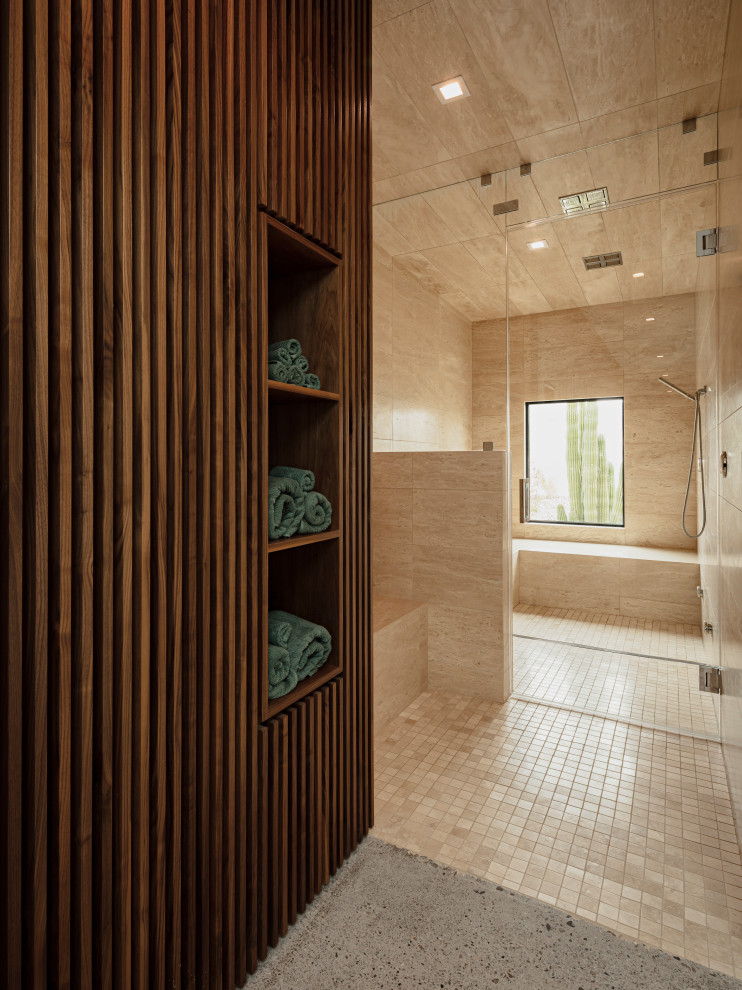 Foto på ett stort amerikanskt vit en-suite badrum, med släta luckor, skåp i mörkt trä, stenkakel, betonggolv, ett undermonterad handfat, bänkskiva i kvarts, grått golv och dusch med gångjärnsdörr