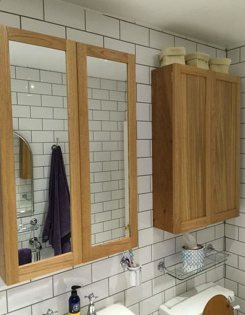 This is an example of a medium sized victorian ensuite bathroom in Cambridgeshire with shaker cabinets and light wood cabinets.