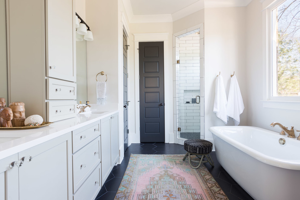 Mid-sized transitional master white tile and ceramic tile porcelain tile bathroom photo in Nashville with shaker cabinets, gray cabinets, an undermount sink, quartz countertops and beige walls