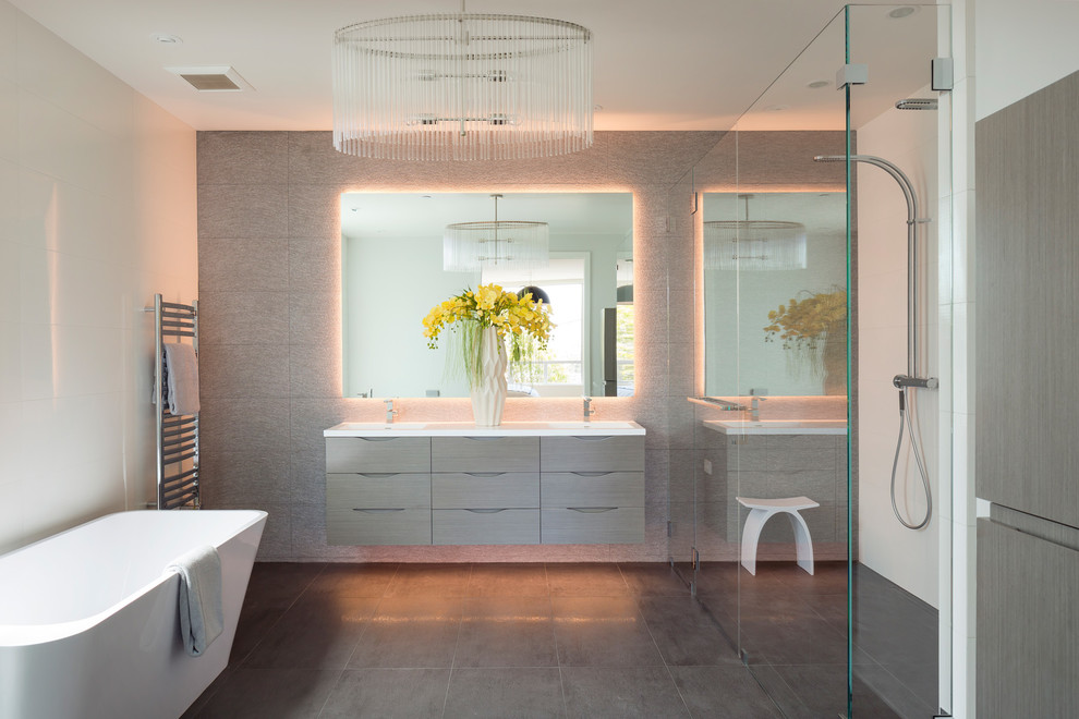 Trendy master bathroom photo in Los Angeles with an integrated sink, flat-panel cabinets and light wood cabinets