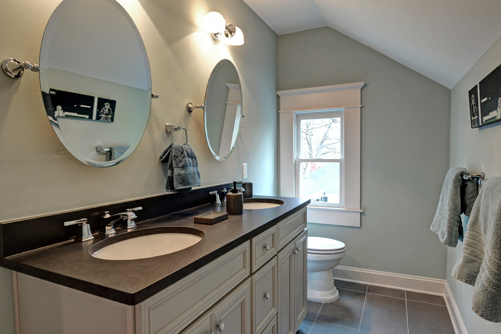 Example of a mid-sized classic kids' gray tile and ceramic tile ceramic tile bathroom design in Atlanta with an undermount sink, gray cabinets, granite countertops, a two-piece toilet and gray walls