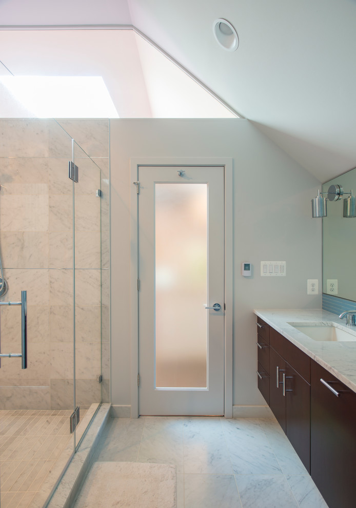 Double shower - large contemporary master blue tile and glass tile porcelain tile double shower idea in DC Metro with an undermount sink, flat-panel cabinets, dark wood cabinets, marble countertops, a one-piece toilet and white walls