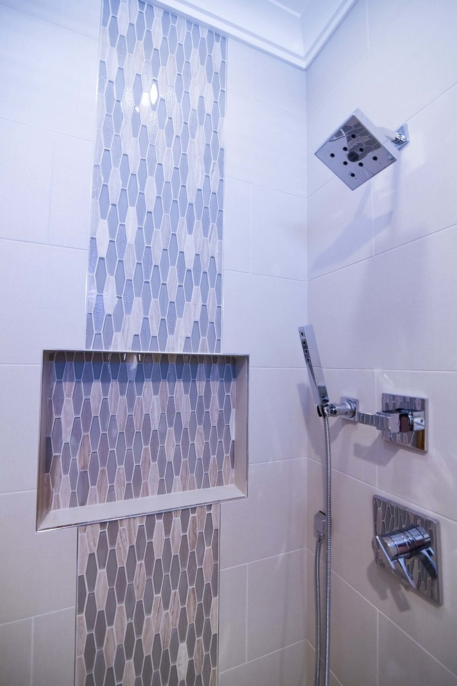 Photo of a medium sized traditional shower room bathroom in Philadelphia with flat-panel cabinets, brown cabinets, an alcove shower, a two-piece toilet, beige tiles, porcelain tiles, beige walls, porcelain flooring, a submerged sink, quartz worktops, beige floors, a hinged door and white worktops.