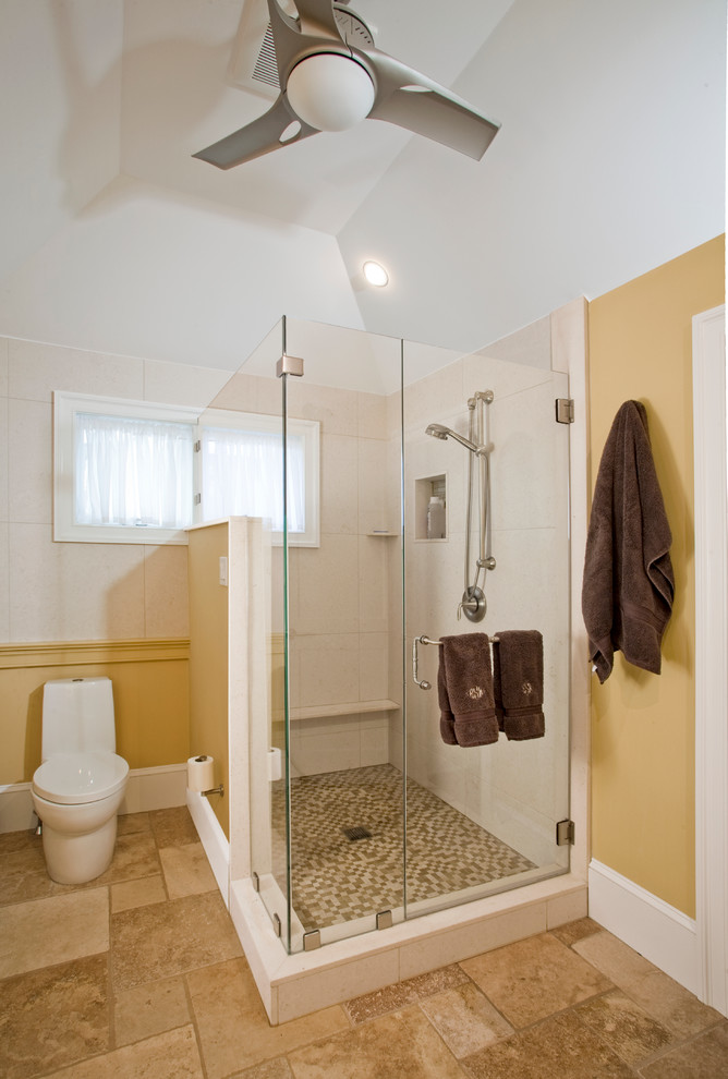 Example of a mid-sized classic master multicolored tile and ceramic tile ceramic tile corner shower design in Philadelphia with a drop-in sink, recessed-panel cabinets, dark wood cabinets, a two-piece toilet and yellow walls