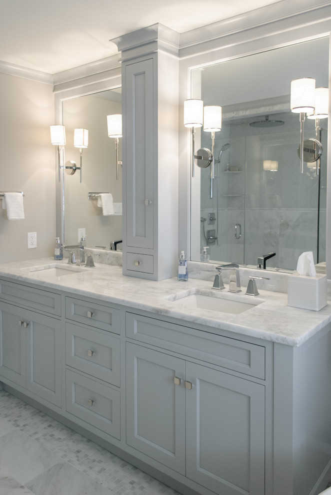 Inspiration for a large transitional master white tile freestanding bathtub remodel in Philadelphia with shaker cabinets, gray cabinets, marble countertops, a one-piece toilet and gray walls