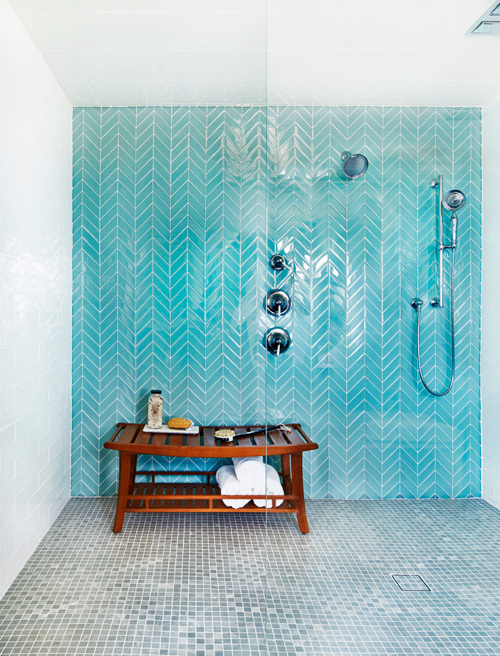 Huge beach style master blue tile and mosaic tile ceramic tile and gray floor alcove shower photo in New York with gray cabinets and a hinged shower door