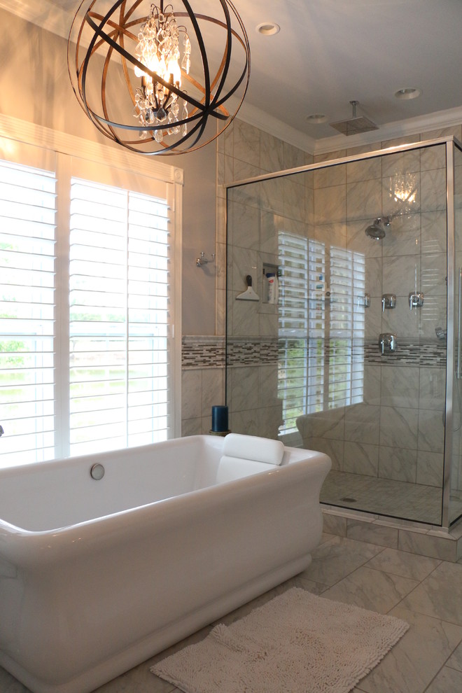 Example of a large island style master gray tile, white tile and marble tile marble floor and gray floor corner shower design in Other with gray walls and a hinged shower door