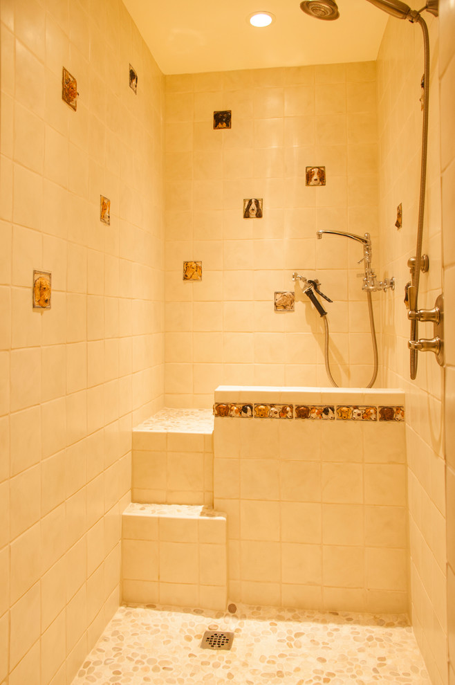 Mid-sized mountain style master beige tile and ceramic tile terra-cotta tile and red floor bathroom photo in Seattle with shaker cabinets, medium tone wood cabinets, an undermount tub, beige walls, a drop-in sink, solid surface countertops and brown countertops
