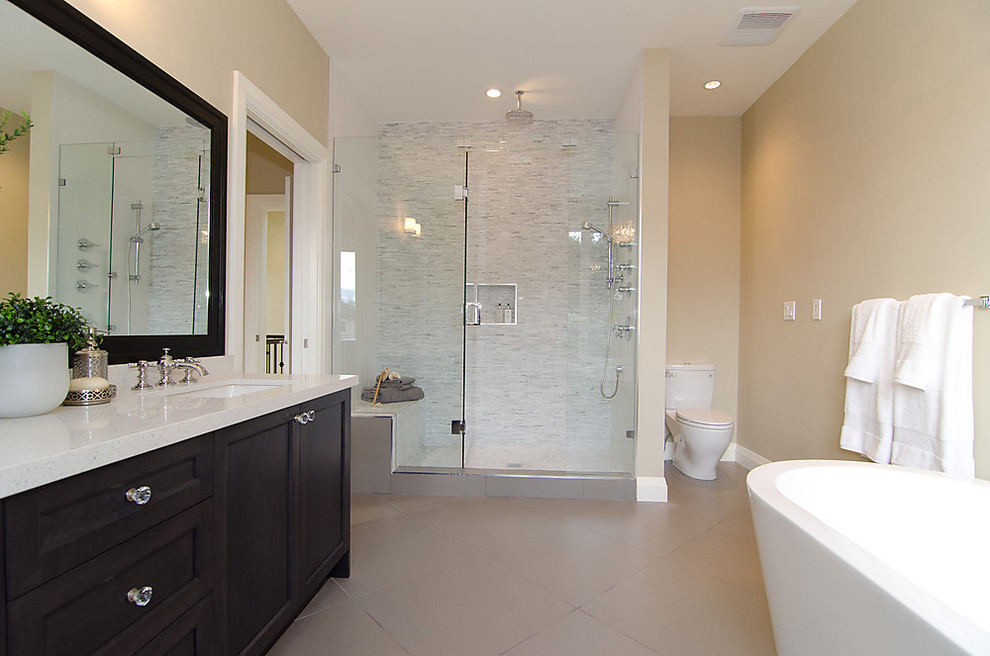 Photo of a contemporary bathroom in Vancouver with a freestanding bath.