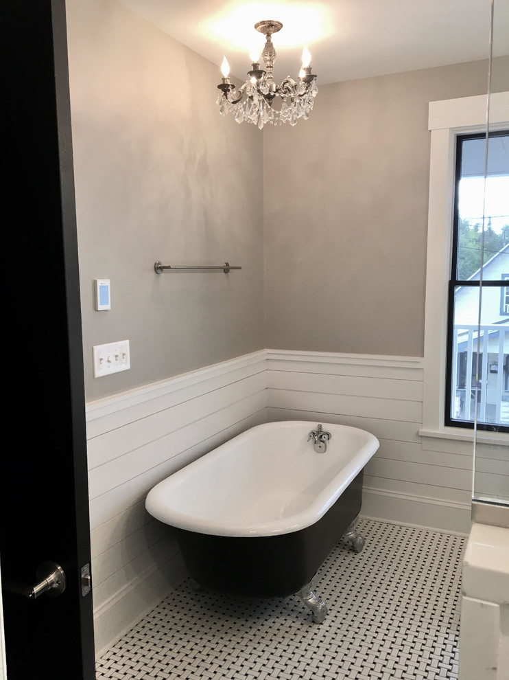 Inspiration for a small country master multicolored floor claw-foot bathtub remodel in Cleveland with shaker cabinets, black cabinets, a two-piece toilet, gray walls, an undermount sink, quartzite countertops and white countertops