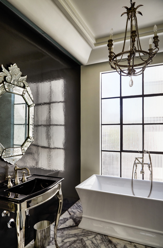 This is an example of a bohemian bathroom in Los Angeles with a freestanding bath, black walls, a console sink, multi-coloured floors, a single sink, a freestanding vanity unit and a drop ceiling.