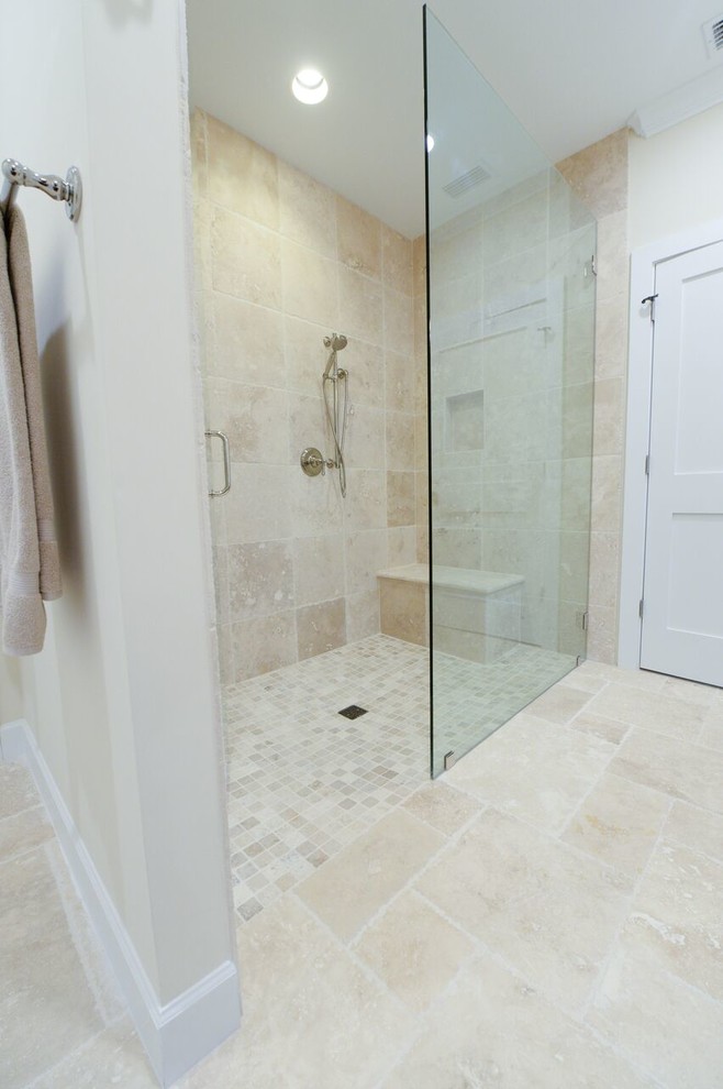 This is an example of a small beach style ensuite bathroom in Jacksonville with flat-panel cabinets, white cabinets, a walk-in shower, beige tiles, terracotta tiles, beige walls, ceramic flooring, a built-in sink and granite worktops.