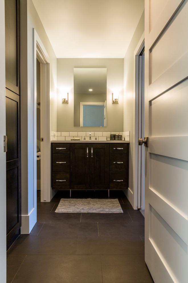 Bathroom - industrial kids' white tile and ceramic tile ceramic tile bathroom idea in Denver with shaker cabinets, dark wood cabinets, gray walls, an undermount sink and quartzite countertops