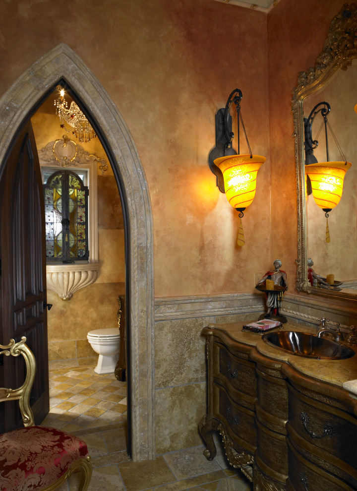 Example of a tuscan bathroom design in Tampa