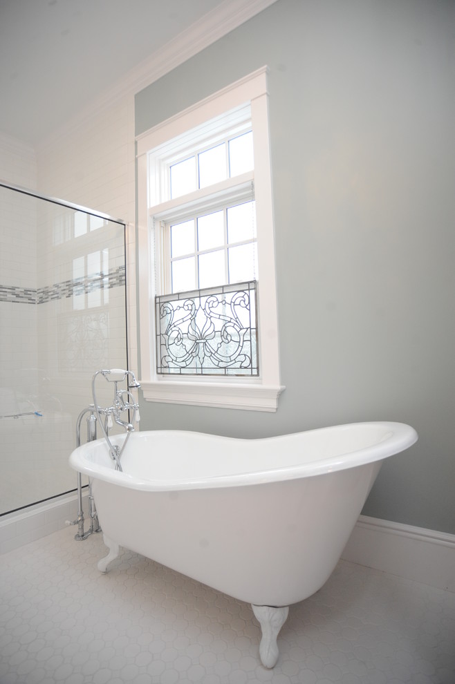 This is an example of a small country ensuite bathroom in Other with a claw-foot bath, an alcove shower, white tiles, porcelain tiles, white walls and porcelain flooring.