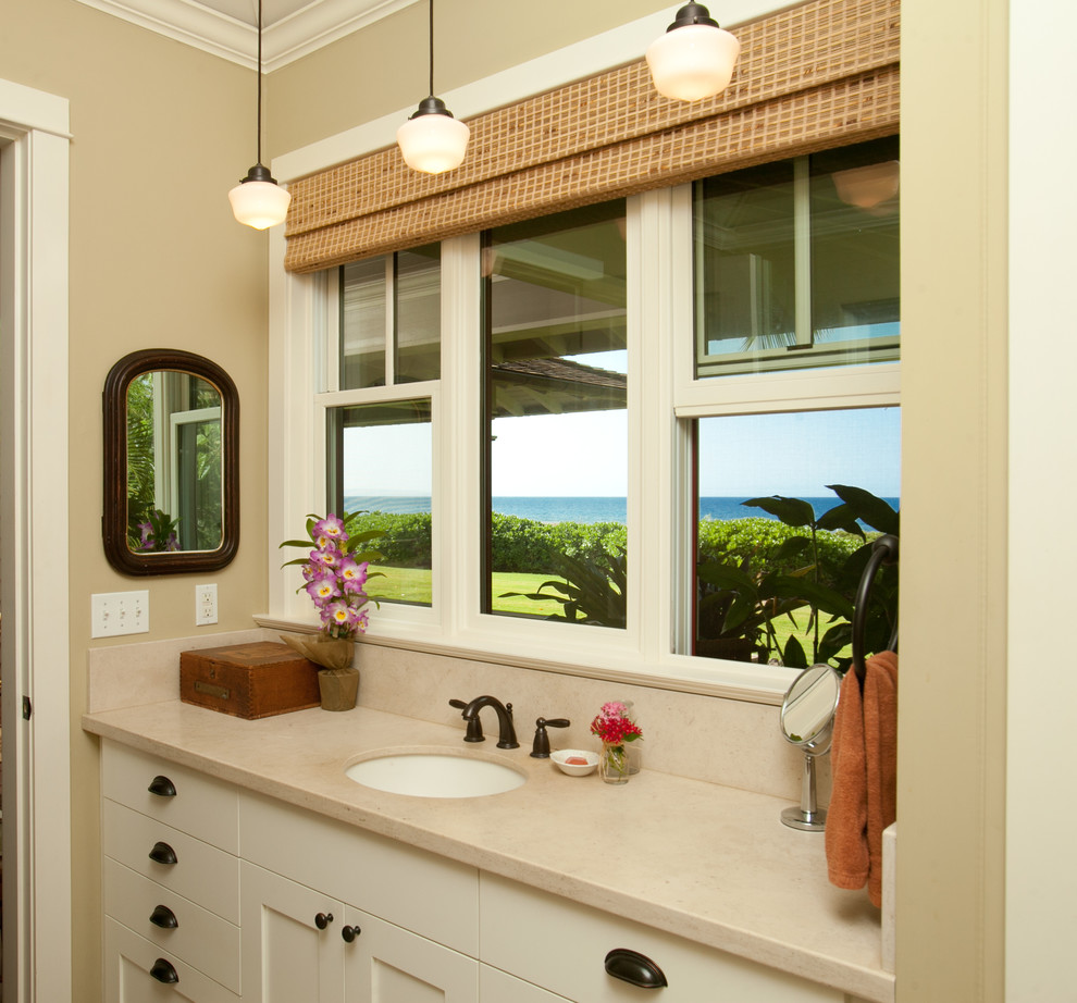 Mid-sized island style master beige tile doorless shower photo in Hawaii with flat-panel cabinets, white cabinets and solid surface countertops