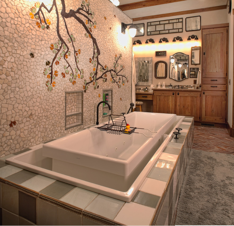 Inspiration for a rustic multicolored tile and mosaic tile brick floor drop-in bathtub remodel in Charleston with shaker cabinets, medium tone wood cabinets and white walls