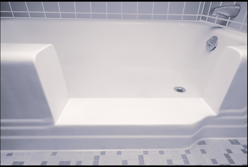 Design ideas for a medium sized traditional ensuite bathroom in Philadelphia with a corner bath, a shower/bath combination, grey walls and mosaic tile flooring.