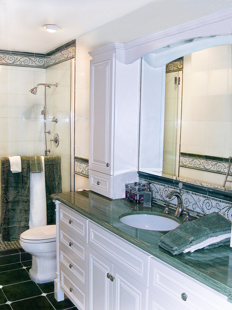 Example of a tuscan green tile and porcelain tile doorless shower design in DC Metro with an undermount sink, raised-panel cabinets, white cabinets, marble countertops and a one-piece toilet
