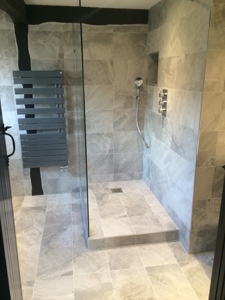 Photo of a modern bathroom in Berkshire with a built-in shower, porcelain tiles and porcelain flooring.