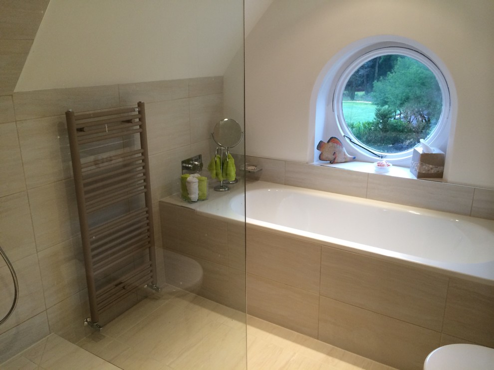 Inspiration for a modern drop-in bathtub remodel in Berkshire