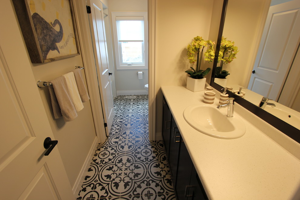Photo of a medium sized contemporary family bathroom in Toronto with flat-panel cabinets, dark wood cabinets, an alcove bath, a shower/bath combination, a one-piece toilet, white tiles, ceramic tiles, grey walls, porcelain flooring, a built-in sink, laminate worktops, black floors and a shower curtain.