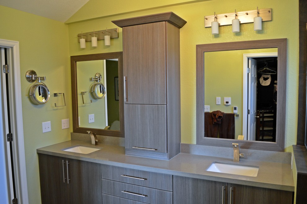 This is an example of a medium sized contemporary bathroom in Denver with green walls and porcelain flooring.