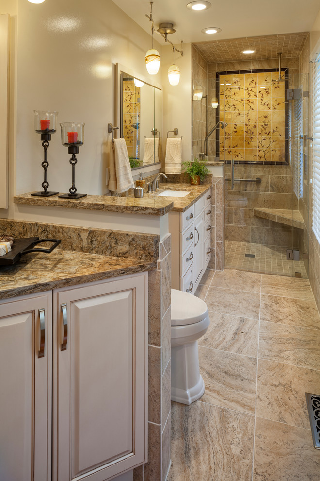 Example of a mid-sized classic master multicolored tile, beige tile and ceramic tile ceramic tile and beige floor alcove shower design in Cincinnati with raised-panel cabinets, white cabinets, white walls, an undermount sink, quartz countertops, a one-piece toilet and a hinged shower door