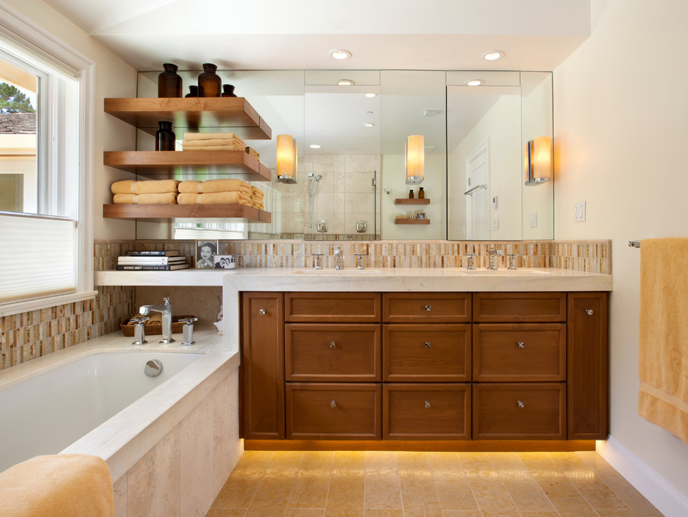 На фото: ванная комната в современном стиле с темными деревянными фасадами с