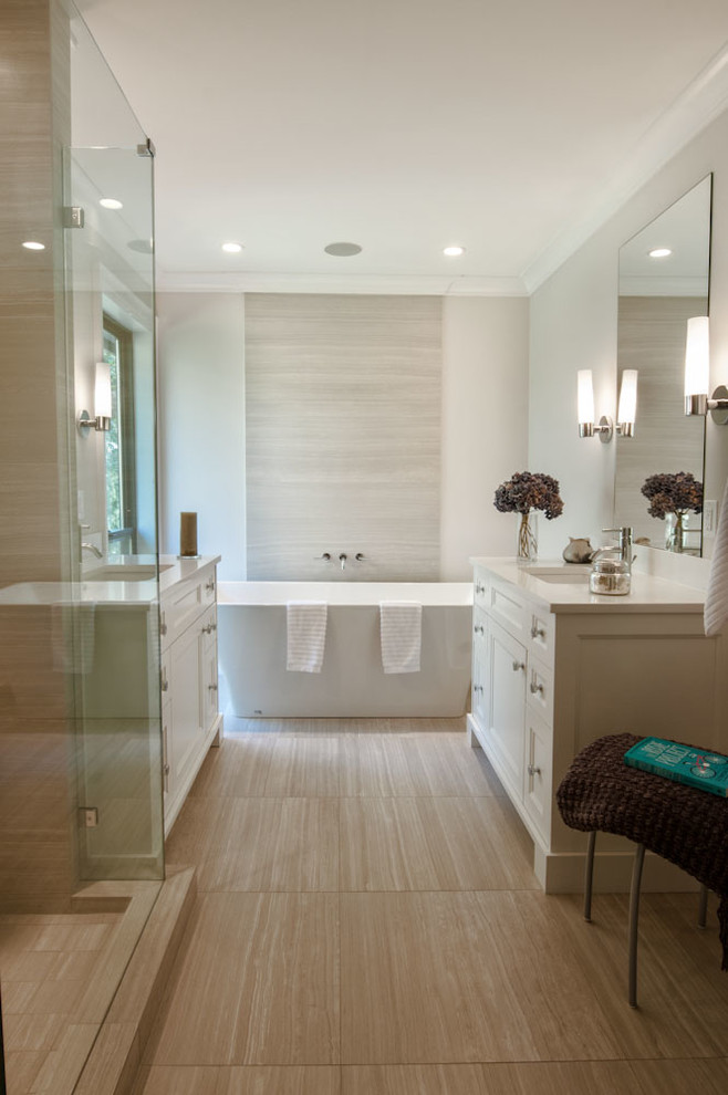 Mid-sized trendy master beige tile and porcelain tile porcelain tile and gray floor bathroom photo in Vancouver with shaker cabinets, white cabinets, white walls, an undermount sink, quartz countertops, a one-piece toilet, a hinged shower door and white countertops