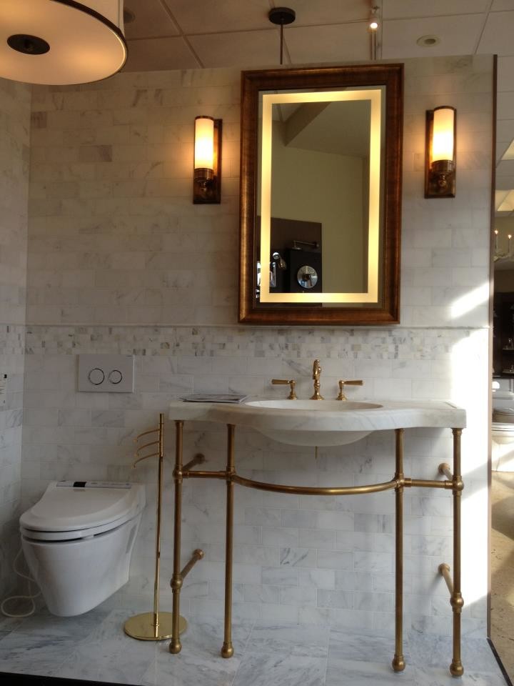 This is an example of a medium sized classic ensuite bathroom in Boston with a wall mounted toilet, grey tiles, stone tiles, multi-coloured walls, marble flooring, a console sink, marble worktops and multi-coloured floors.