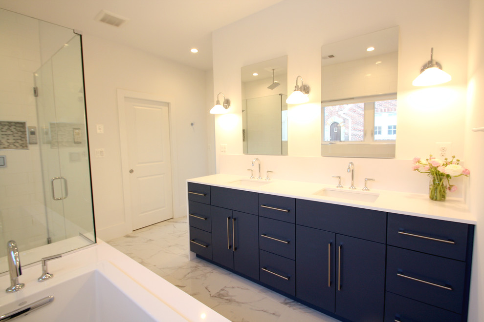 Minimalist master white tile and porcelain tile porcelain tile bathroom photo in DC Metro with flat-panel cabinets, blue cabinets, a one-piece toilet, white walls, an undermount sink and quartz countertops