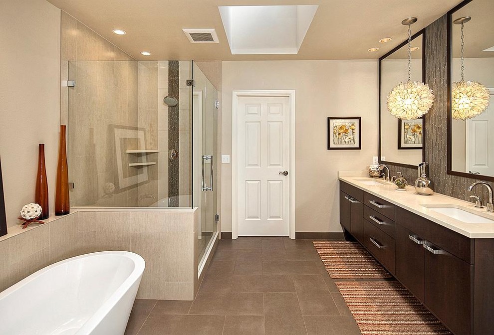 Large transitional master brown tile ceramic tile bathroom photo in Seattle with an undermount sink, furniture-like cabinets, dark wood cabinets, quartzite countertops and beige walls