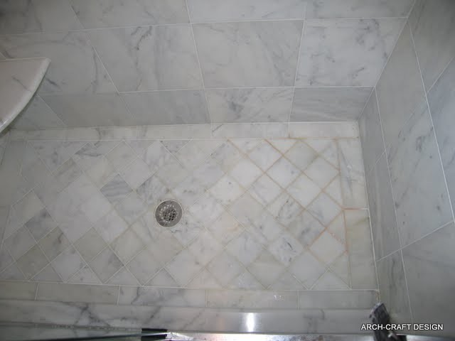 Inspiration for a medium sized modern ensuite bathroom in DC Metro with an alcove shower, white tiles, stone tiles, white walls and marble flooring.