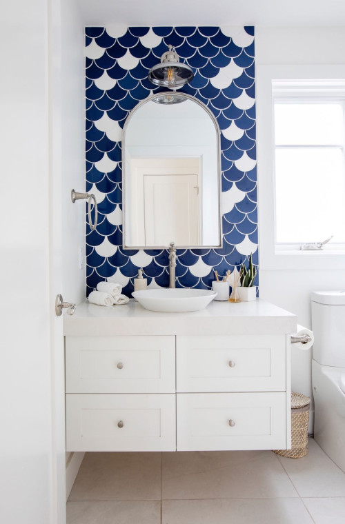 Stunning contemporary black, white and gold bathroom boasts white