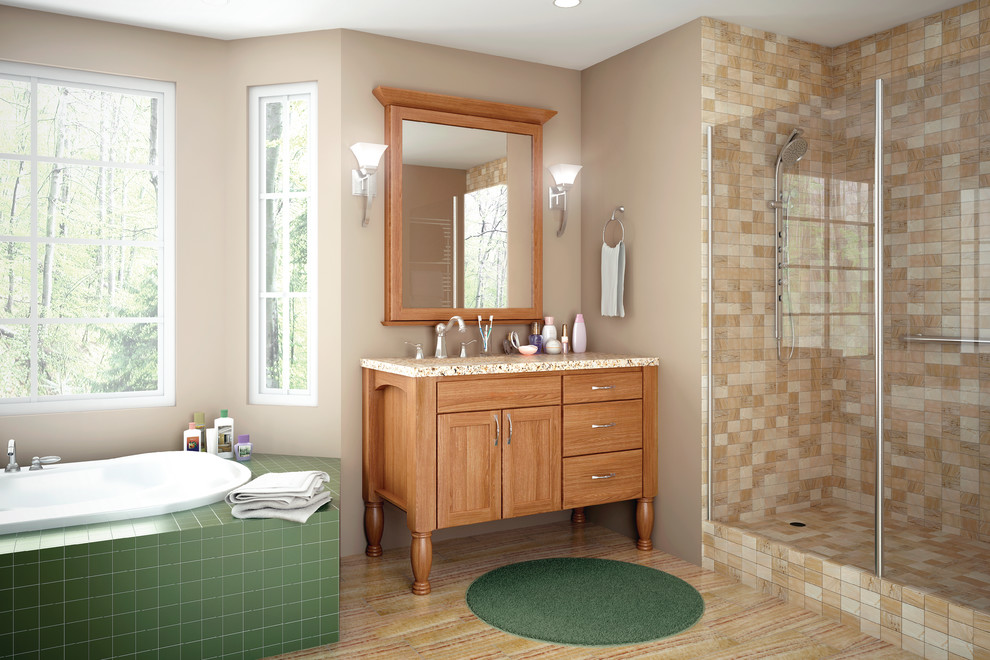 Idée de décoration pour une salle de bain principale design en bois clair avec un lavabo encastré, un placard en trompe-l'oeil, un plan de toilette en granite, une baignoire posée, une douche d'angle, un carrelage vert, des carreaux de céramique, un mur beige et parquet clair.