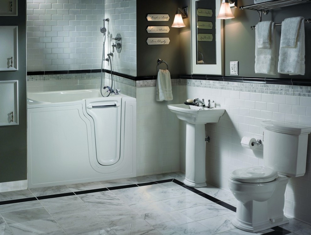 Photo of a medium sized classic shower room bathroom in Other with a japanese bath, a shower/bath combination, a two-piece toilet, black tiles, grey tiles, white tiles, metro tiles, grey walls, marble flooring, a pedestal sink, white floors and a hinged door.