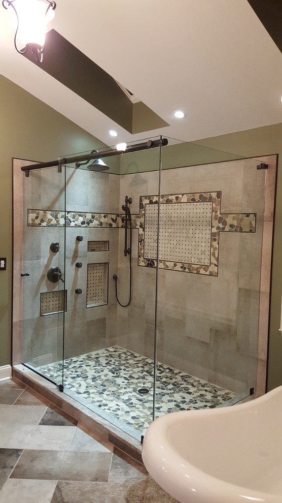 Bathroom - large traditional master beige tile and stone tile slate floor and multicolored floor bathroom idea in Philadelphia with raised-panel cabinets, dark wood cabinets, green walls, an undermount sink, quartzite countertops, a hinged shower door and white countertops