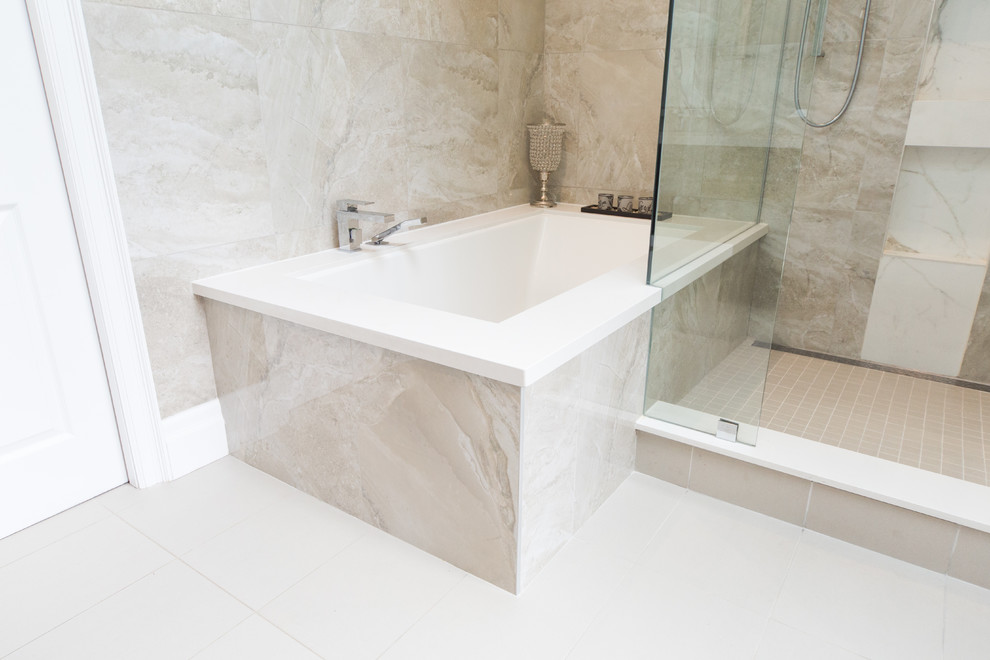 Inspiration for a medium sized contemporary ensuite bathroom in Toronto with shaker cabinets, dark wood cabinets, a submerged bath, an alcove shower, a two-piece toilet, beige tiles, marble tiles, beige walls, porcelain flooring, a submerged sink, solid surface worktops, white floors, a hinged door and white worktops.