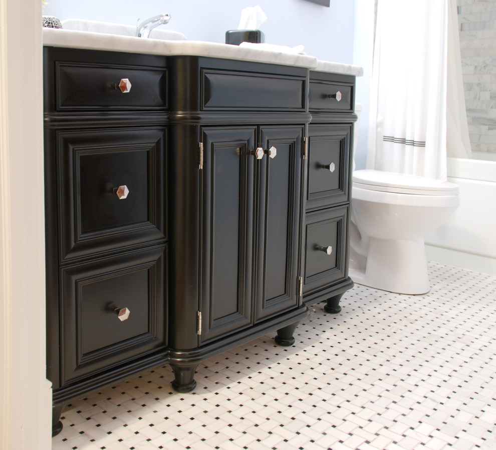 Inspiration for a small timeless 3/4 gray tile and marble tile mosaic tile floor and multicolored floor bathroom remodel in Chicago with an undermount sink, recessed-panel cabinets, black cabinets, marble countertops, blue walls and a two-piece toilet