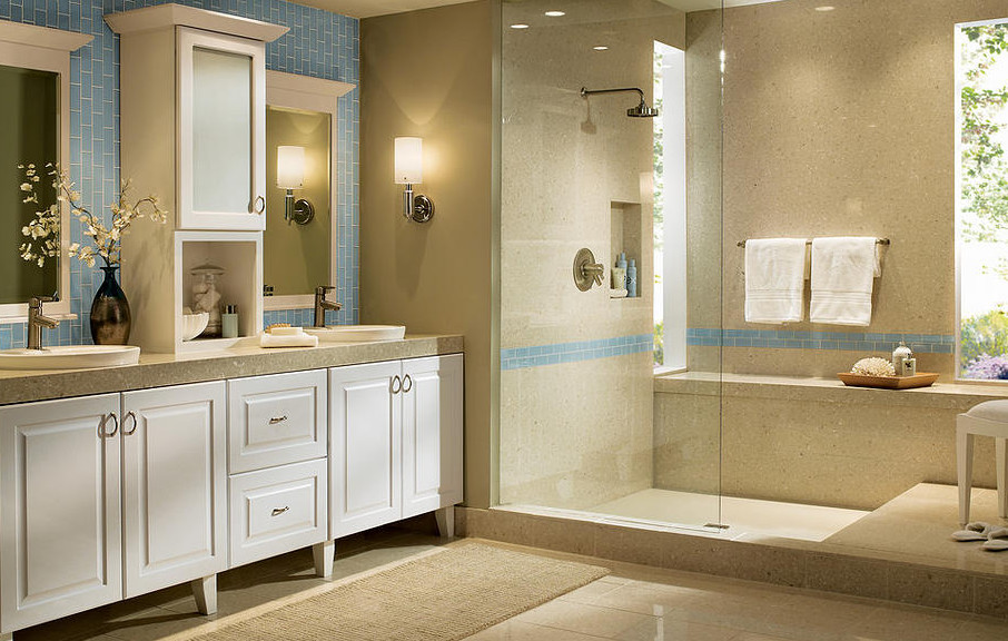 This is an example of a large classic ensuite bathroom in Orlando with raised-panel cabinets, white cabinets, an alcove shower, blue tiles, metro tiles, brown walls, vinyl flooring, a vessel sink, granite worktops, beige floors and an open shower.